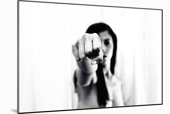 Young Adult Female with Arm Outstretched Like Punch-Torsten Richter-Mounted Photographic Print