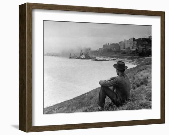 Young African American Boy Sitting on Memphis Riverbank Watching Boats on the Mississippi River-Ed Clark-Framed Photographic Print