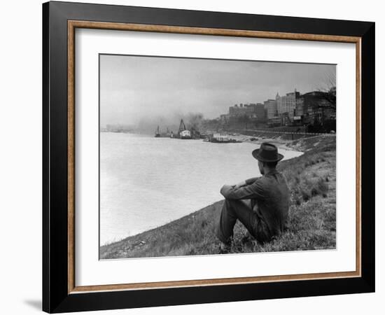 Young African American Boy Sitting on Memphis Riverbank Watching Boats on the Mississippi River-Ed Clark-Framed Photographic Print