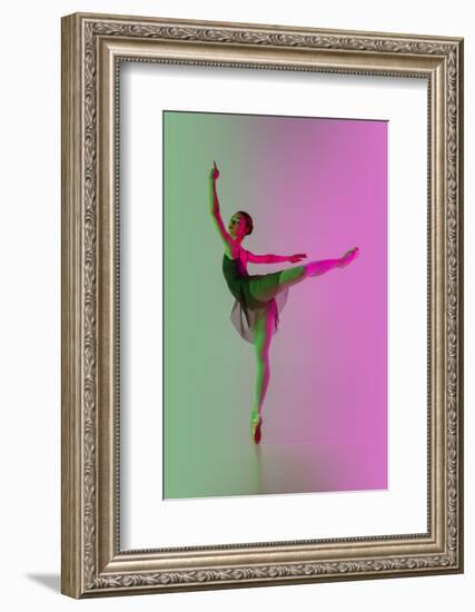 Young and Graceful Ballet Dancer Isolated on Gradient Pink-Green Studio Background in Neon Light. A-master1305-Framed Photographic Print