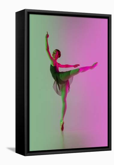 Young and Graceful Ballet Dancer Isolated on Gradient Pink-Green Studio Background in Neon Light. A-master1305-Framed Premier Image Canvas