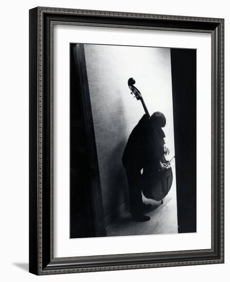 Young Bassist Member of Alexander Schneider's New York String Orchestra Tuning His Instrument-Gjon Mili-Framed Photographic Print