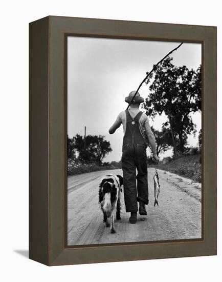 Young Boy and His Dog Walking Home from Fishing-Myron Davis-Framed Premier Image Canvas