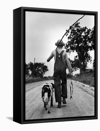 Young Boy and His Dog Walking Home from Fishing-Myron Davis-Framed Premier Image Canvas