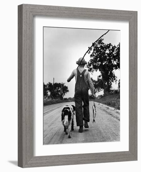 Young Boy and His Dog Walking Home from Fishing-Myron Davis-Framed Photographic Print