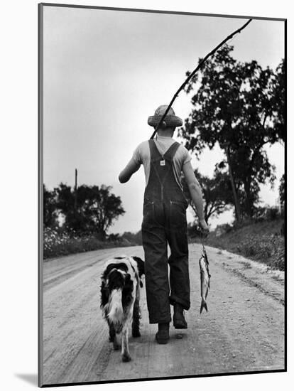 Young Boy and His Dog Walking Home from Fishing-Myron Davis-Mounted Photographic Print