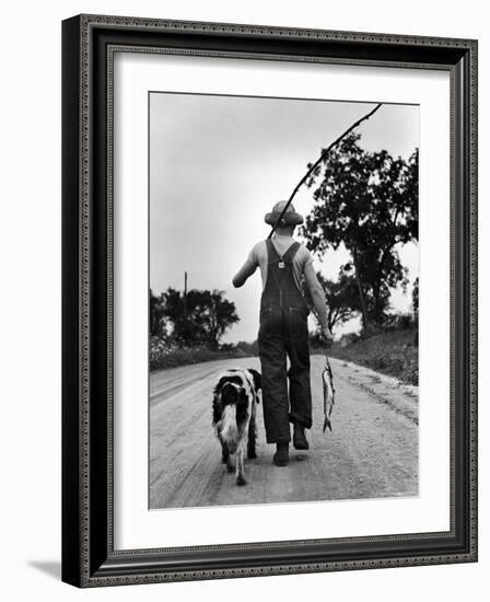 Young Boy and His Dog Walking Home from Fishing-Myron Davis-Framed Photographic Print