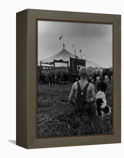 Young Boy and His Dog Watching the Circus Tents Being Set Up-Myron Davis-Framed Premier Image Canvas