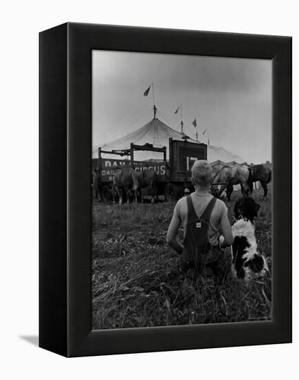 Young Boy and His Dog Watching the Circus Tents Being Set Up-Myron Davis-Framed Premier Image Canvas