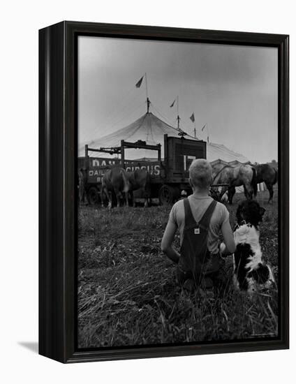 Young Boy and His Dog Watching the Circus Tents Being Set Up-Myron Davis-Framed Premier Image Canvas