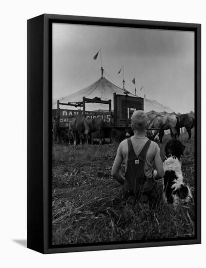 Young Boy and His Dog Watching the Circus Tents Being Set Up-Myron Davis-Framed Premier Image Canvas