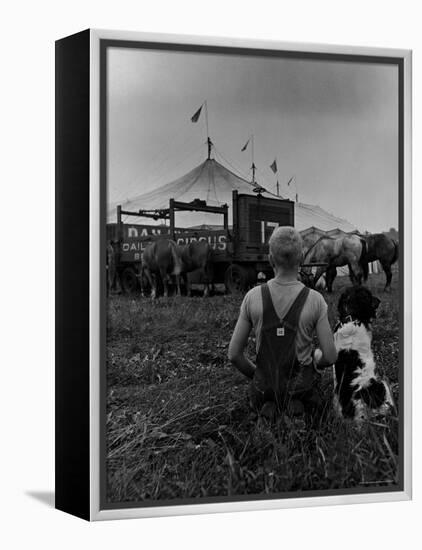 Young Boy and His Dog Watching the Circus Tents Being Set Up-Myron Davis-Framed Premier Image Canvas