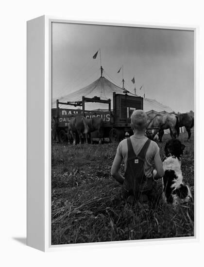 Young Boy and His Dog Watching the Circus Tents Being Set Up-Myron Davis-Framed Premier Image Canvas