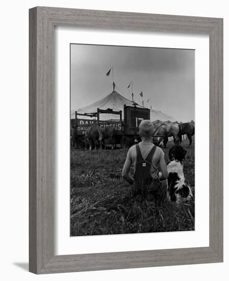 Young Boy and His Dog Watching the Circus Tents Being Set Up-Myron Davis-Framed Photographic Print