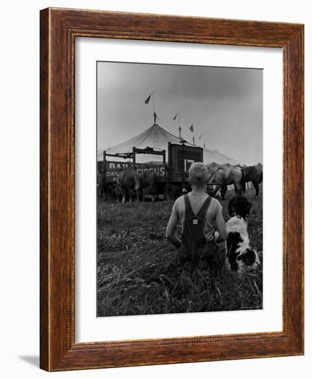 Young Boy and His Dog Watching the Circus Tents Being Set Up-Myron Davis-Framed Photographic Print