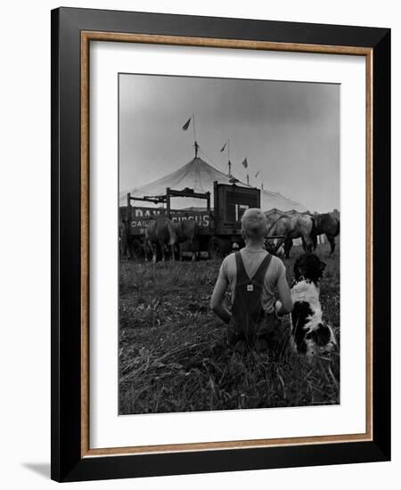 Young Boy and His Dog Watching the Circus Tents Being Set Up-Myron Davis-Framed Photographic Print