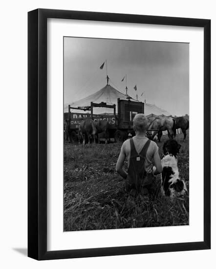 Young Boy and His Dog Watching the Circus Tents Being Set Up-Myron Davis-Framed Photographic Print