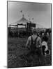 Young Boy and His Dog Watching the Circus Tents Being Set Up-Myron Davis-Mounted Photographic Print