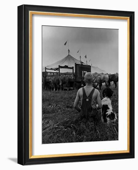 Young Boy and His Dog Watching the Circus Tents Being Set Up-Myron Davis-Framed Photographic Print