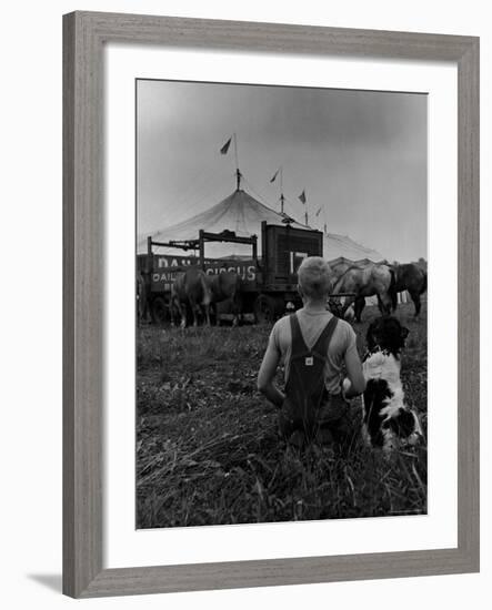 Young Boy and His Dog Watching the Circus Tents Being Set Up-Myron Davis-Framed Photographic Print