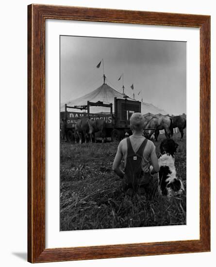 Young Boy and His Dog Watching the Circus Tents Being Set Up-Myron Davis-Framed Photographic Print