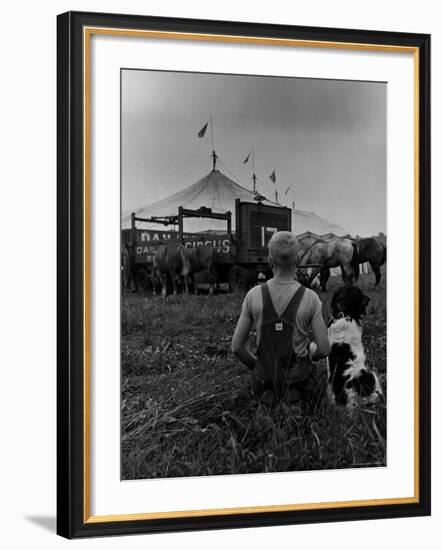 Young Boy and His Dog Watching the Circus Tents Being Set Up-Myron Davis-Framed Photographic Print