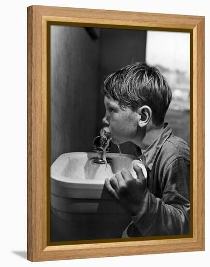 Young Boy Drinking from a Water Fountain-Allan Grant-Framed Premier Image Canvas