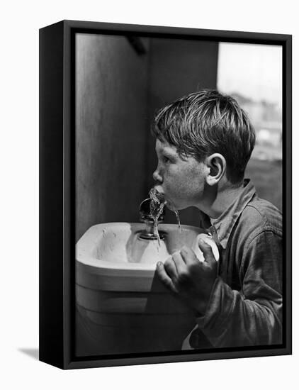 Young Boy Drinking from a Water Fountain-Allan Grant-Framed Premier Image Canvas