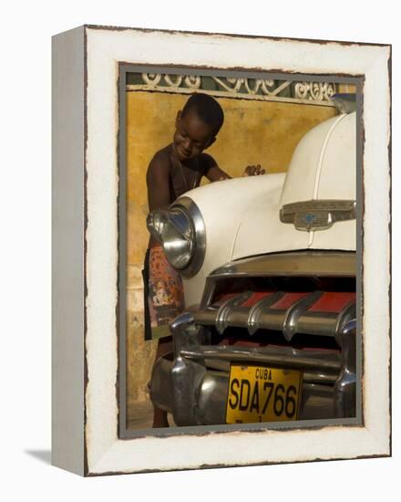 Young Boy Drumming on Old American Car's Bonnet,Trinidad, Sancti Spiritus Province, Cuba-Eitan Simanor-Framed Premier Image Canvas