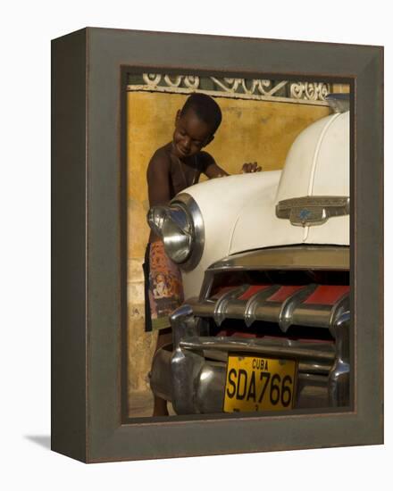 Young Boy Drumming on Old American Car's Bonnet,Trinidad, Sancti Spiritus Province, Cuba-Eitan Simanor-Framed Premier Image Canvas