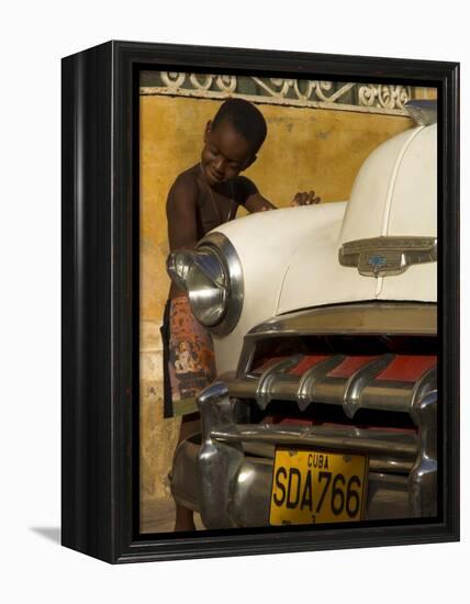 Young Boy Drumming on Old American Car's Bonnet,Trinidad, Sancti Spiritus Province, Cuba-Eitan Simanor-Framed Premier Image Canvas