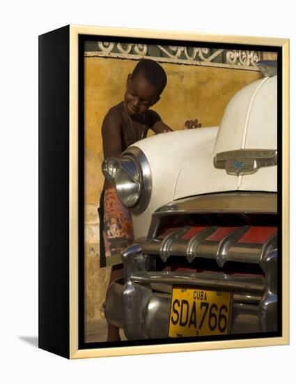 Young Boy Drumming on Old American Car's Bonnet,Trinidad, Sancti Spiritus Province, Cuba-Eitan Simanor-Framed Premier Image Canvas