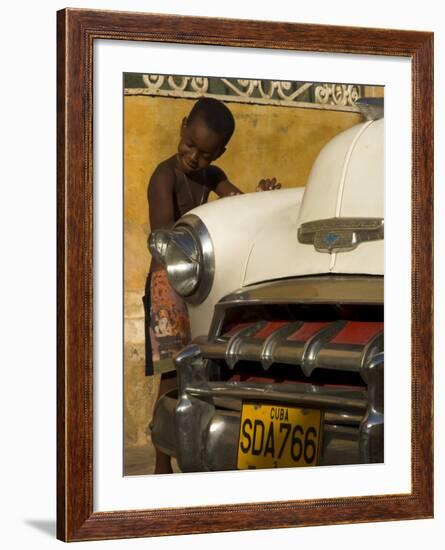 Young Boy Drumming on Old American Car's Bonnet,Trinidad, Sancti Spiritus Province, Cuba-Eitan Simanor-Framed Photographic Print