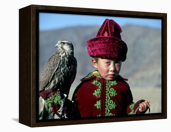 Young Boy Holding a Falcon, Golden Eagle Festival, Mongolia-Amos Nachoum-Framed Premier Image Canvas