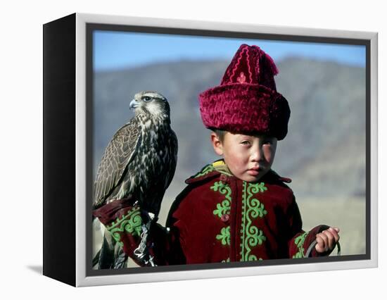 Young Boy Holding a Falcon, Golden Eagle Festival, Mongolia-Amos Nachoum-Framed Premier Image Canvas