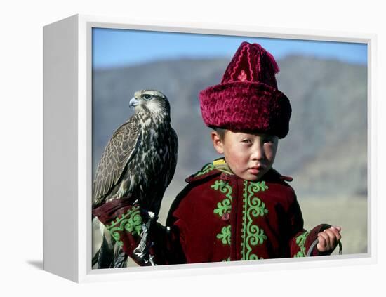 Young Boy Holding a Falcon, Golden Eagle Festival, Mongolia-Amos Nachoum-Framed Premier Image Canvas