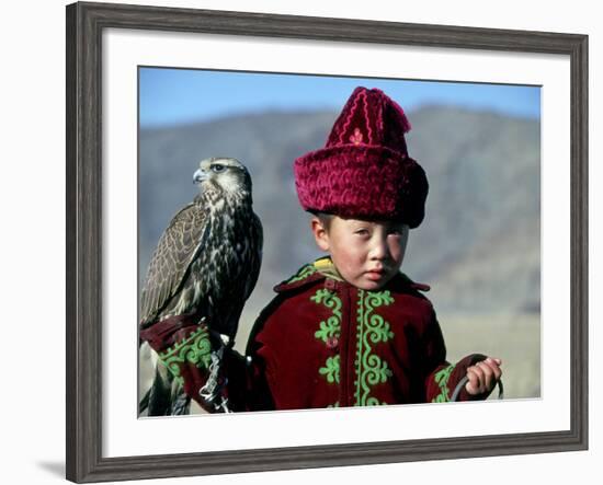 Young Boy Holding a Falcon, Golden Eagle Festival, Mongolia-Amos Nachoum-Framed Photographic Print