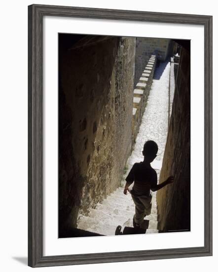 Young Boy in Tower of Castelo de Sao Jorge, Portgual-Merrill Images-Framed Photographic Print