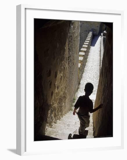 Young Boy in Tower of Castelo de Sao Jorge, Portgual-Merrill Images-Framed Photographic Print
