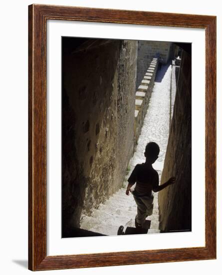 Young Boy in Tower of Castelo de Sao Jorge, Portgual-Merrill Images-Framed Photographic Print