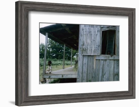 Young Boy on the Porch and a Second Boy Looking Out of Window, on Edisto Island, South Carolina-Walter Sanders-Framed Photographic Print