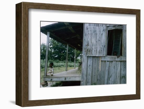 Young Boy on the Porch and a Second Boy Looking Out of Window, on Edisto Island, South Carolina-Walter Sanders-Framed Photographic Print