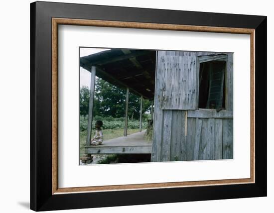 Young Boy on the Porch and a Second Boy Looking Out of Window, on Edisto Island, South Carolina-Walter Sanders-Framed Photographic Print