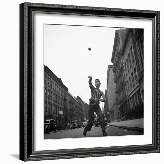 Young Boy Pitching Ball on a City Street-Cornell Capa-Framed Photographic Print