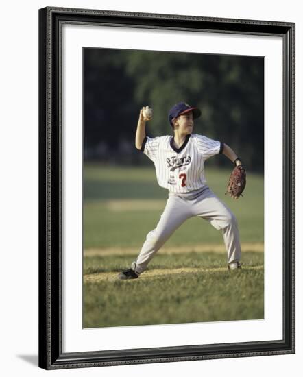 Young Boy Pitching During a Little League Baseball Games-null-Framed Photographic Print