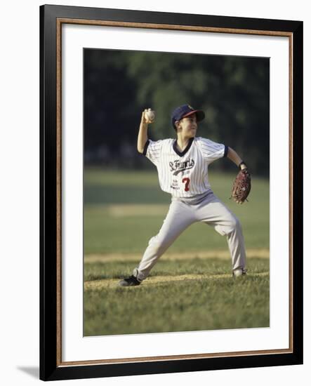 Young Boy Pitching During a Little League Baseball Games-null-Framed Photographic Print