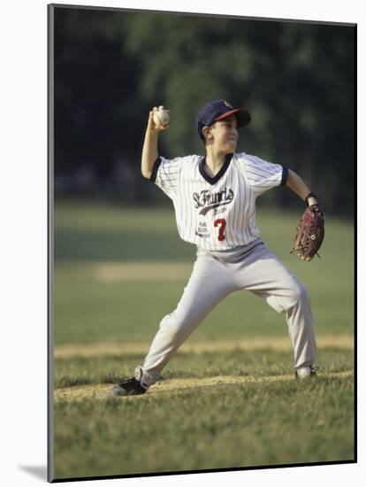 Young Boy Pitching During a Little League Baseball Games-null-Mounted Photographic Print