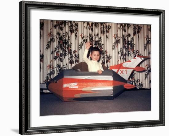 Young Boy Plays in a Cardboard Rocketship, Ca. 1956-null-Framed Photographic Print