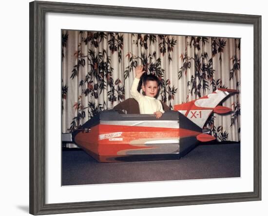 Young Boy Plays in a Cardboard Rocketship, Ca. 1956-null-Framed Photographic Print