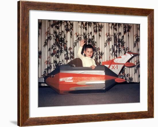 Young Boy Plays in a Cardboard Rocketship, Ca. 1956-null-Framed Photographic Print